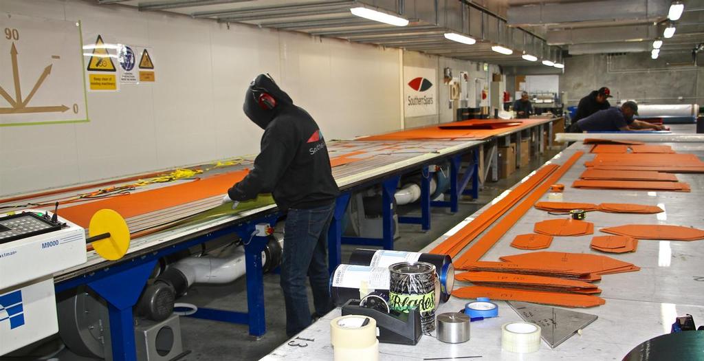 Cutting pre-preg boom patches in a cold, temperature controlled room with a robotic cutter - Southern Spars, Avondale facility, Auckland NZ April 18, 2016 © Richard Gladwell www.photosport.co.nz